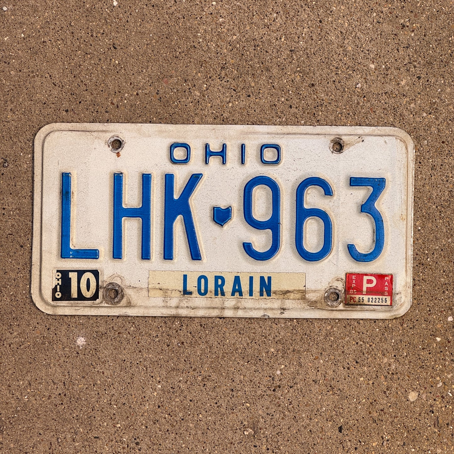 Photo of a 1980 1985 Ohio License Plate Auto Tag 2 Vintage Garage LHK 963 with original patina