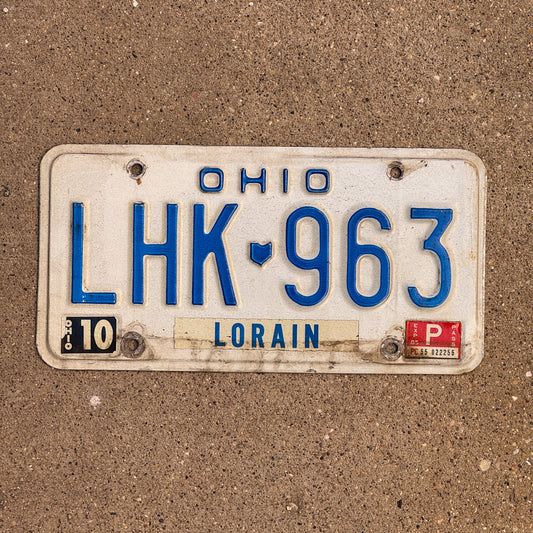 Photo of a 1980 1985 Ohio License Plate Auto Tag 2 Vintage Garage LHK 963 with original patina