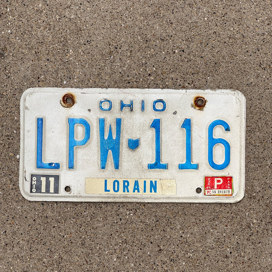 Photo of a 1980 1985 Ohio License Plate Auto Tag 2 Vintage Garage LPW 116 with original patina