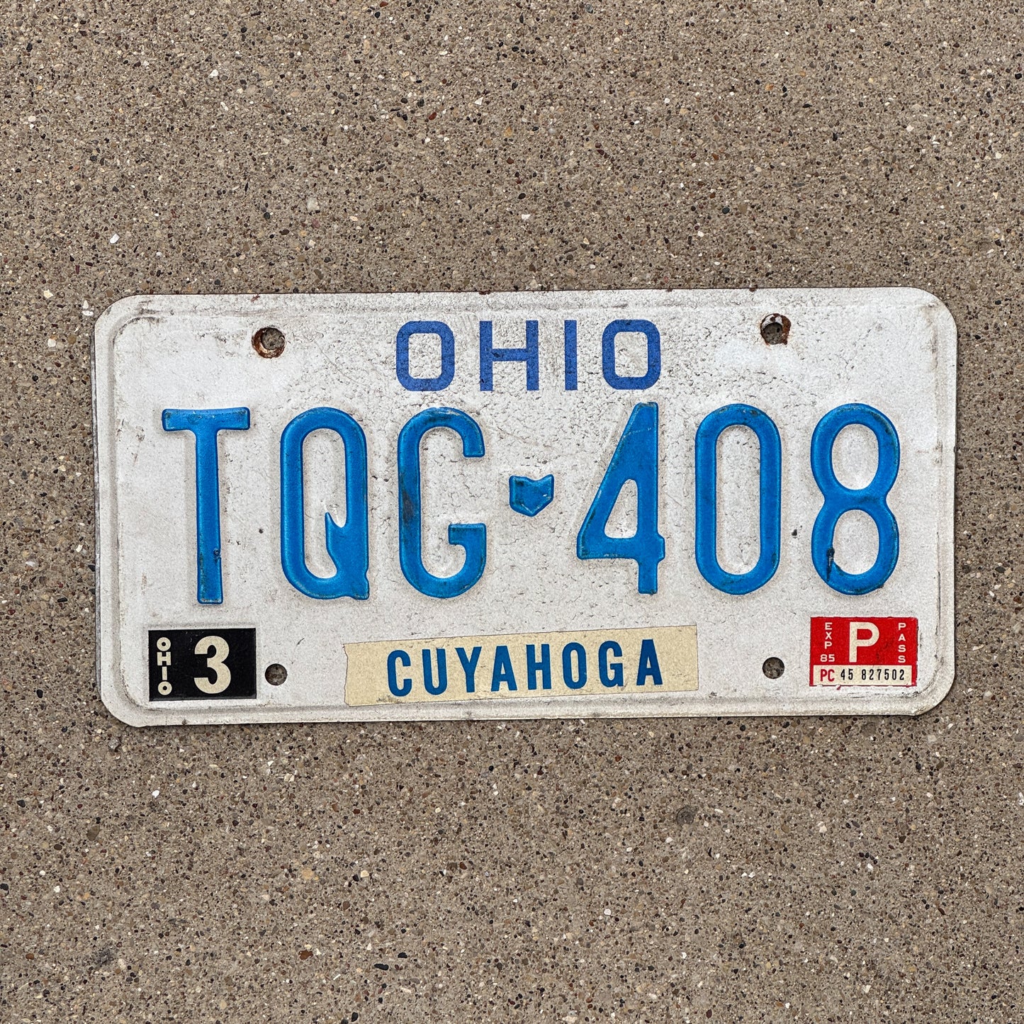 Photo of a 1980 1985 Ohio License Plate Auto Tag 2 Vintage Garage TQG 408 with original patina