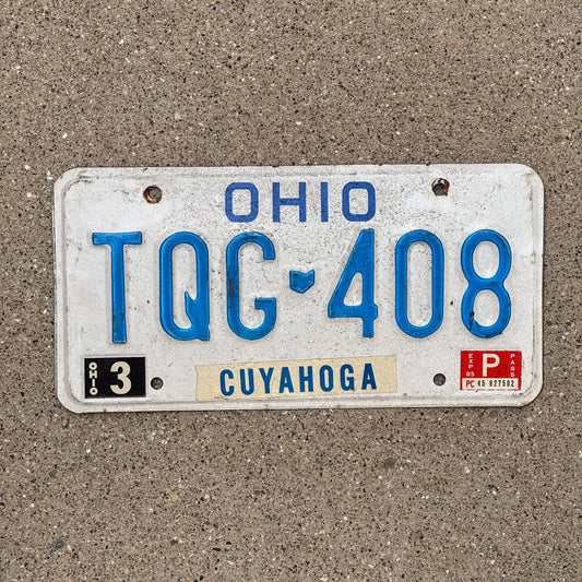 Photo of a 1980 1985 Ohio License Plate Auto Tag 2 Vintage Garage TQG 408 with original patina