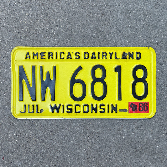Photo of a 1980 1986 Wisconsin License Plate Auto Tag Garage Decor Vintage NW 6818 with original patina