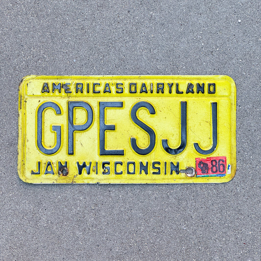 Photo of a 1980 1986 Wisconsin Vanity License Plate Auto Tag Garage Decor Vintage GPES JJ with original patina
