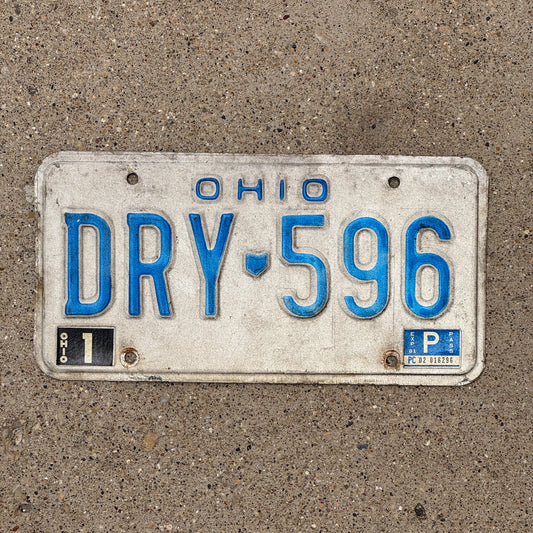 Photo of a 1980 1991 Ohio License Plate Auto Tag 1 Vintage Garage DRY 596 with original patina