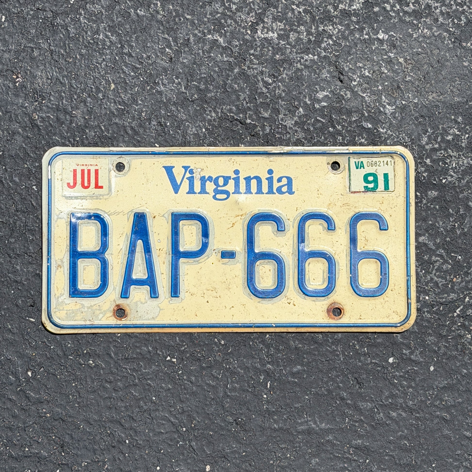 Photo of a 1980 1991 Virginia License Plate Auto Tag Garage Decor Vintage 666 Devil Evil Repeat Repeating BAP 666 with original patina