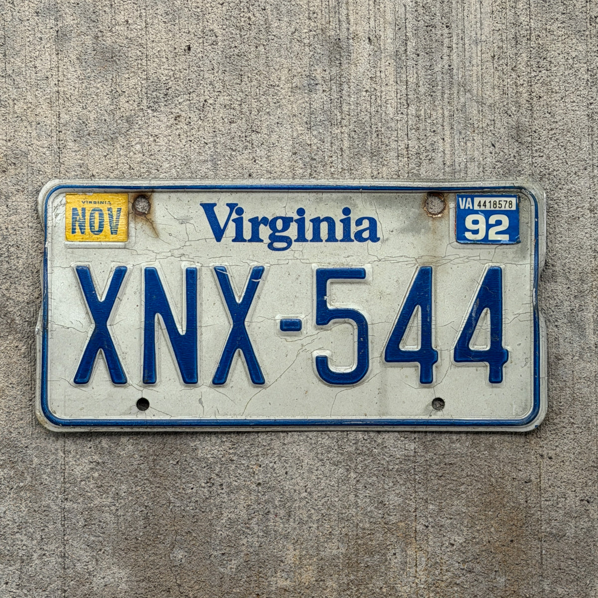 Photo of a 1980 1992 Virginia License Plate Auto Tag Garage Decor Vintage XNX 544 with original patina