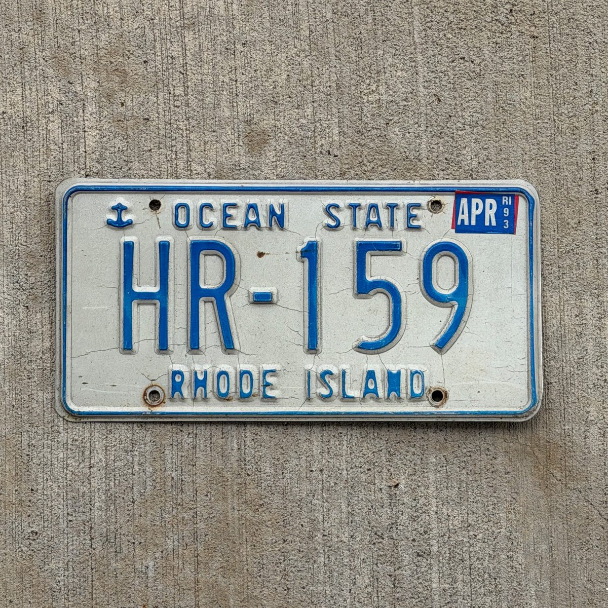 Photo of a 1980 1993 Rhode Island License Plate Auto Tag Garage Decor Vintage HR 159 with original patina