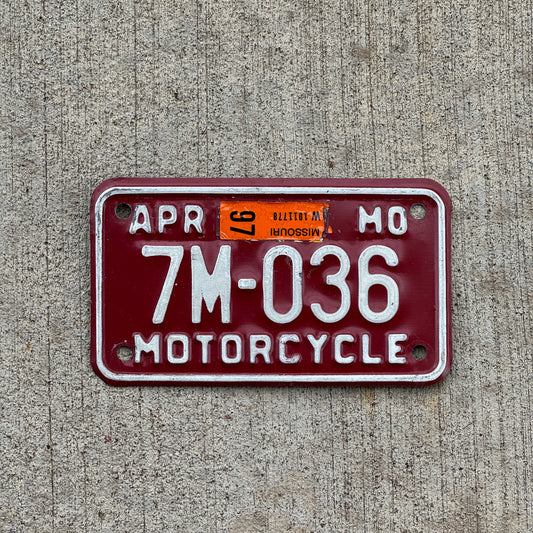 Photo of a 1980 1997 Missouri Motorcycle License Plate Auto Tag Garage Decor Vintage 7M 036 with original patina