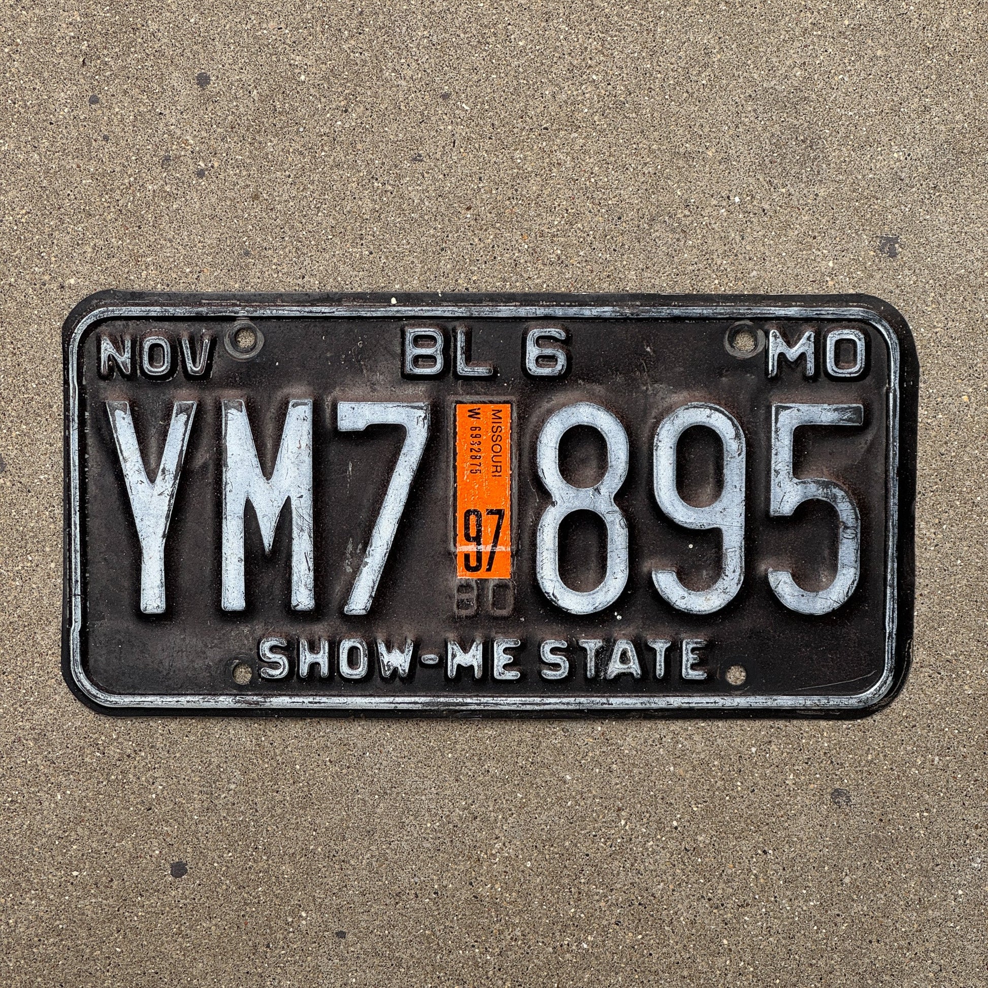 Photo of a 1980 1997 Missouri Truck License Plate Auto Tag Garage Decor Vintage YM7 895
