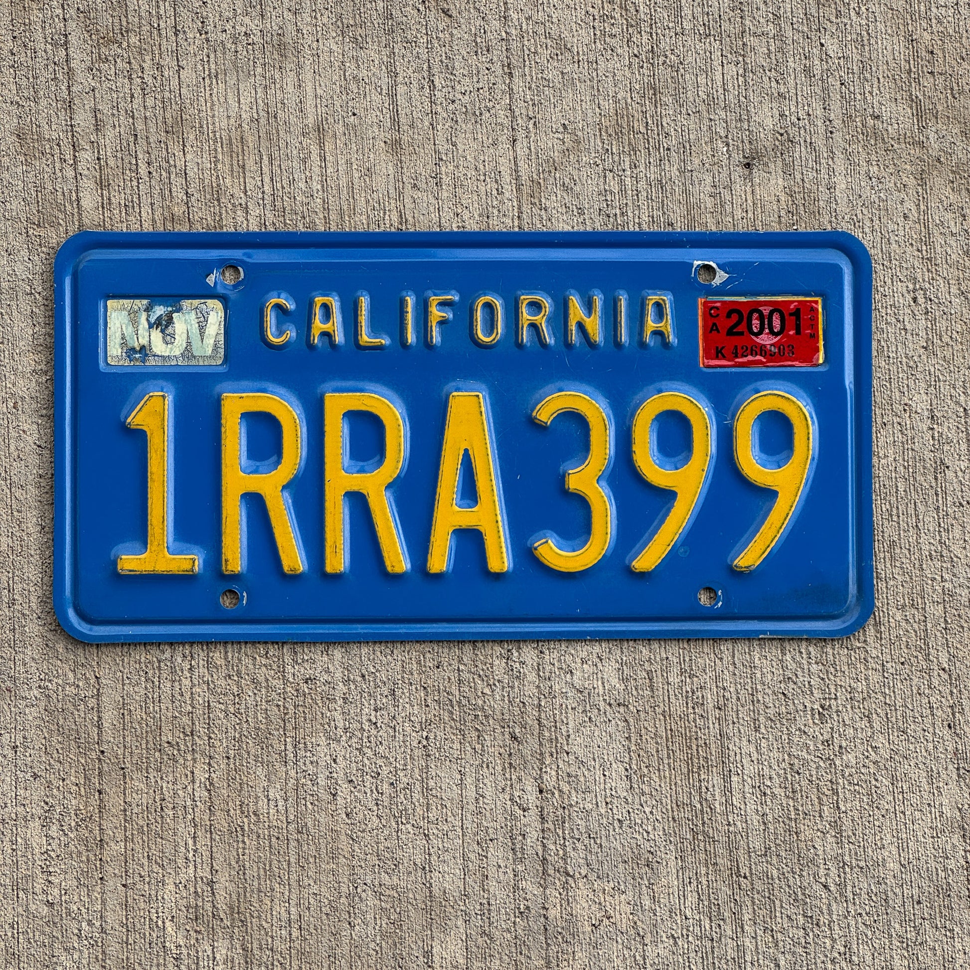Photo of a 1980 2001 California License Plate Auto Tag Garage Decor Vintage 1 RRA 399 with original patina