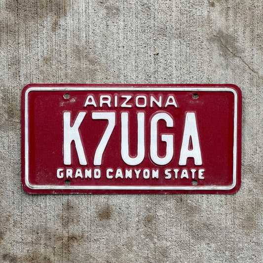 Photo of a 1980 Arizona Ham Radio License Plate Auto Tag Garage Decor Vintage Barry Goldwater Provinance K7 UGA with original patina