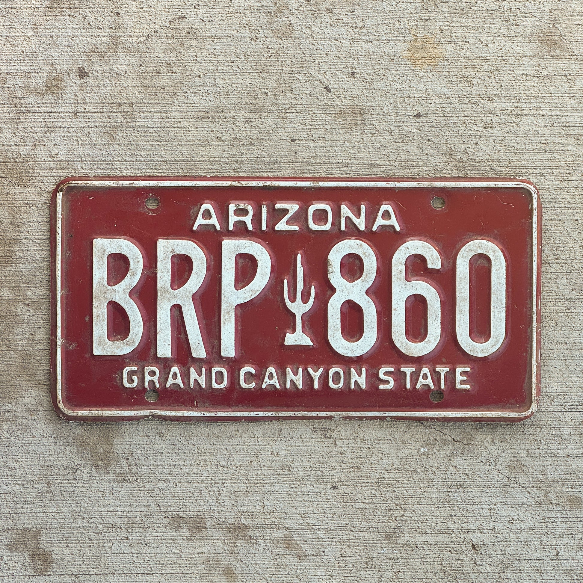 Photo of a 1980 Arizona License Plate Auto Tag 2 Vintage Garage BRP 860 with original patina