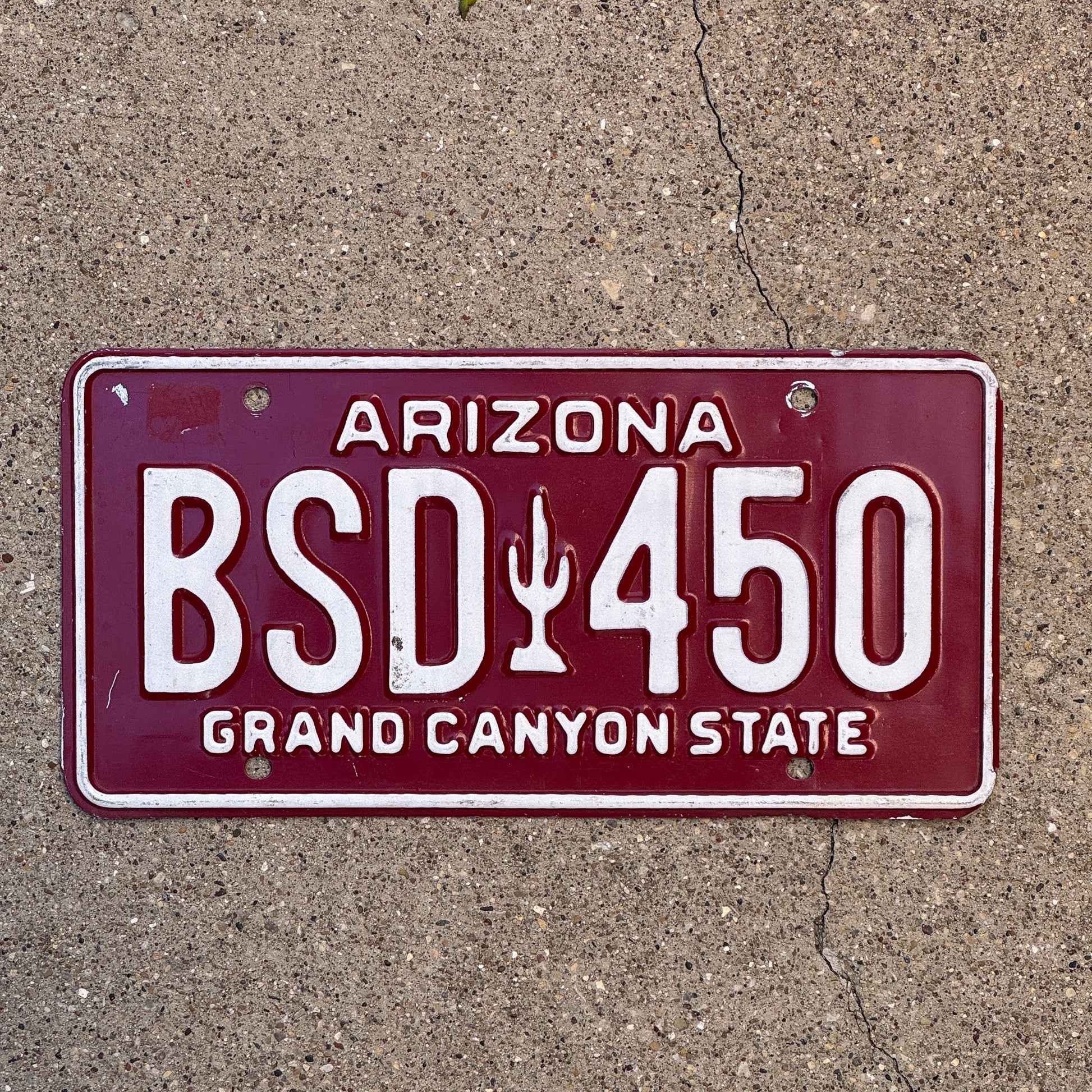 Photo of a 1980 Arizona License Plate Auto Tag Garage Decor Vintage Cactus BSD 450 with original patina
