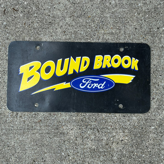 Photo of a 1980 Era Bound Brook Ford New Jersey Booster License Plate Auto Tag Garage Decor Vintage
 Ford Car Plastic with original patina