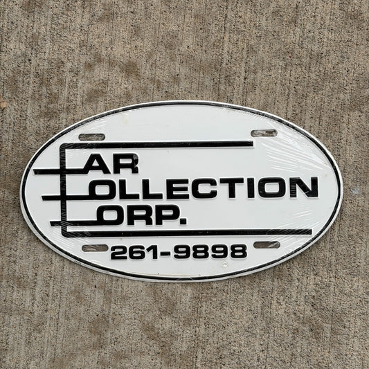 Photo of a 1980 Era Car Collection Corp Booster License Plate Auto Tag Garage Decor Vintage Oval Metal with original patina