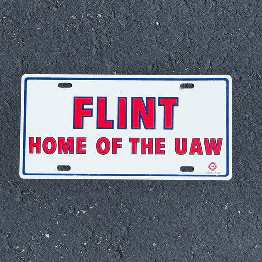 Photo of a 1980 Era Flint Michigan Booster License Plate Auto Tag Garage Decor Vintage
 Home of the UAW Union Metal with original patina