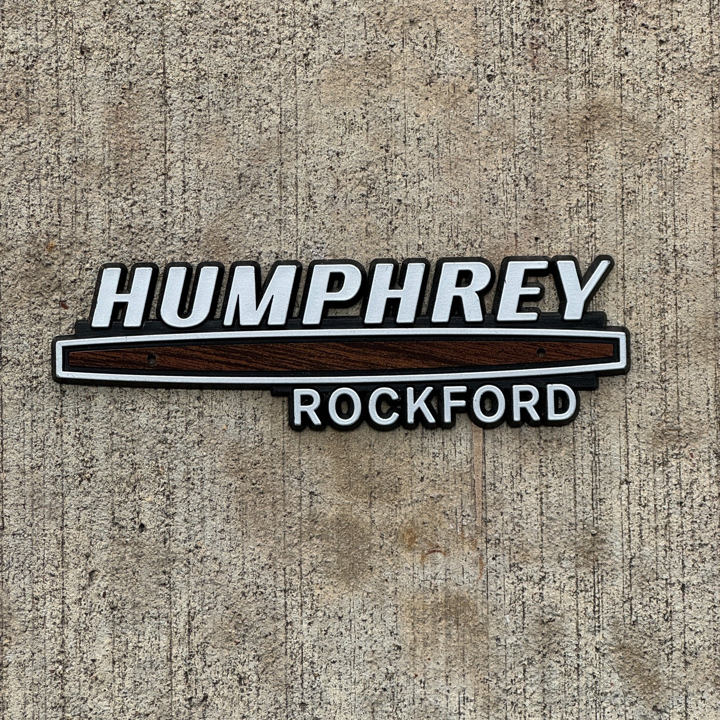 Photo of a 1980 Era Humphrey Rockford Illinois Dealer Badge Emblem Auto Tag Garage Decor Vintage Plastic Cadillac Olds Dealership with original patina