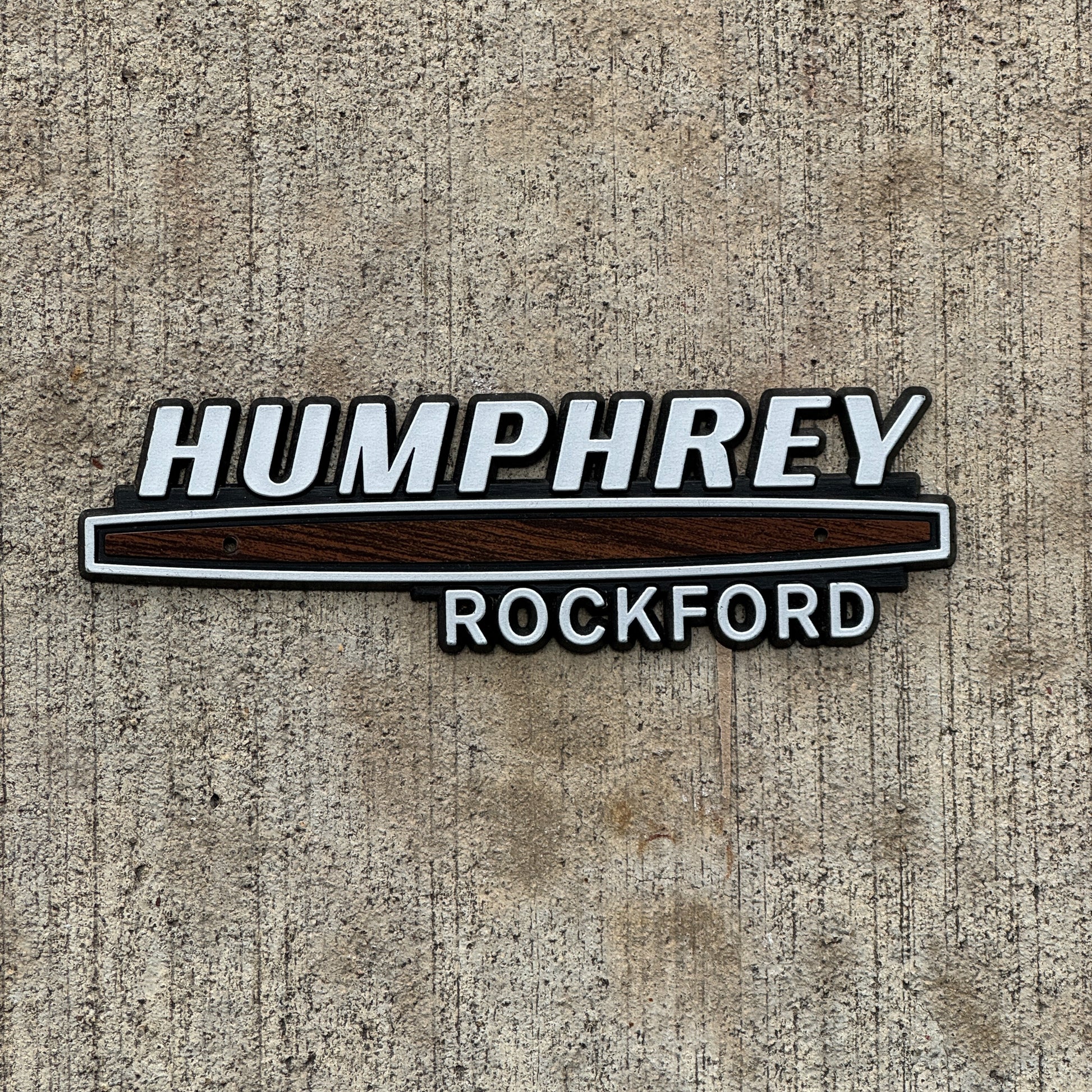 Photo of a 1980 Era Humphrey Rockford Illinois Dealer Badge Emblem Auto Tag Garage Decor Vintage Plastic Cadillac Olds Dealership with original patina