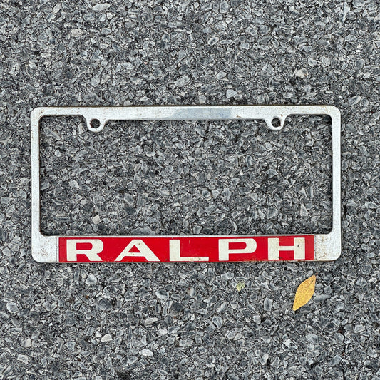 Photo of a 1980 Era License Plate Frame Auto Tag 2 Garage Decor Metal RALPH