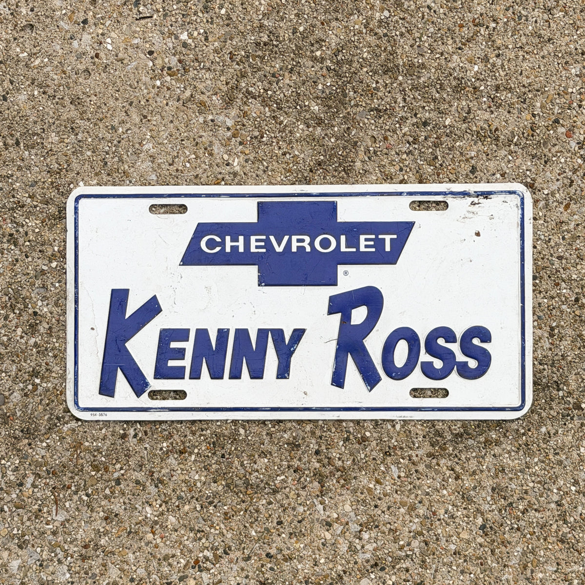 Photo of a 1980 Era Pennsylvania Booster License Plate Auto Tag Garage Decor Vintage Kenny Ross Chevrolet Chevy Metal with original patina