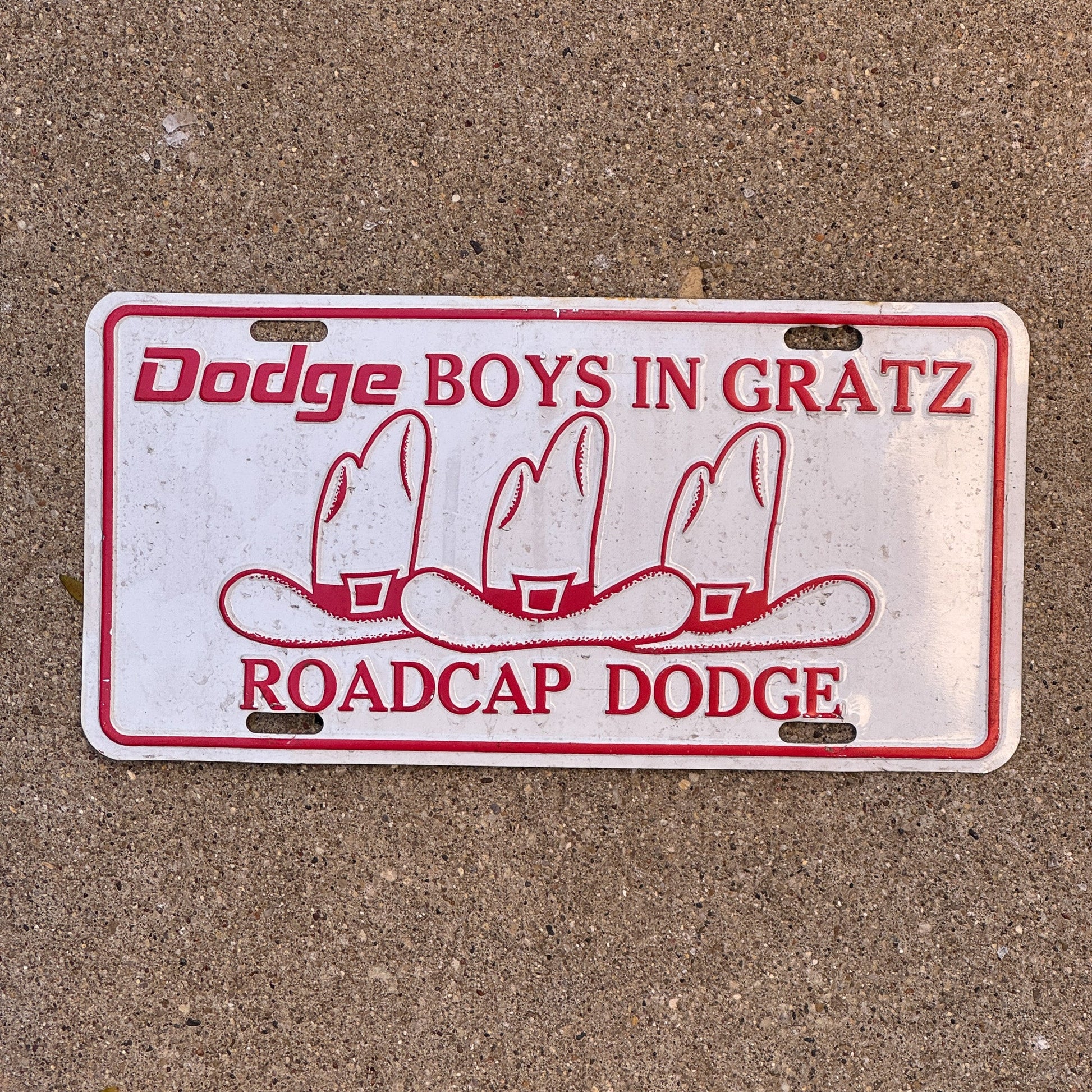 Photo of a 1980 Era Pennsylvania License Plate Booster License Plate Auto Tag Garage Decor Vintage Gratz Dodge Boys Metal Roadcap Dodge with original patina