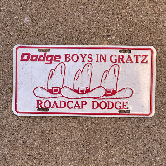 Photo of a 1980 Era Pennsylvania License Plate Booster License Plate Auto Tag Garage Decor Vintage Gratz Dodge Boys Metal Roadcap Dodge with original patina