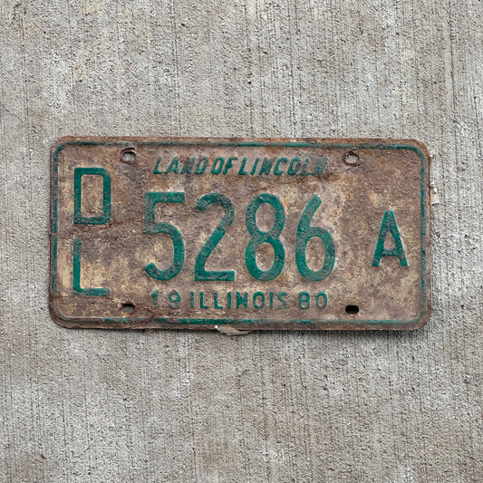 Photo of a 1980 Illinois Dealer License Plate Auto Tag 1 Vintage Garage 5286 A with original patina