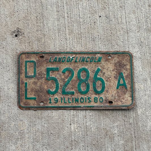Photo of a 1980 Illinois Dealer License Plate Auto Tag 2 Vintage Garage 5286 A with original patina