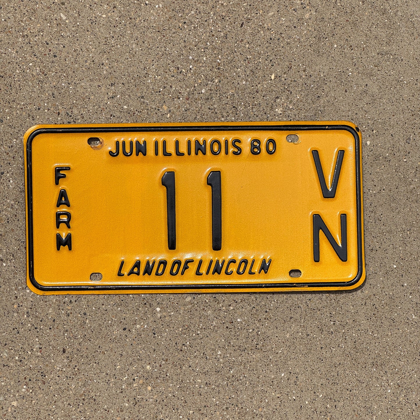 Photo of a 1980 Illinois Farm License Plate Auto Tag Garage Decor Vintage 11 VN
