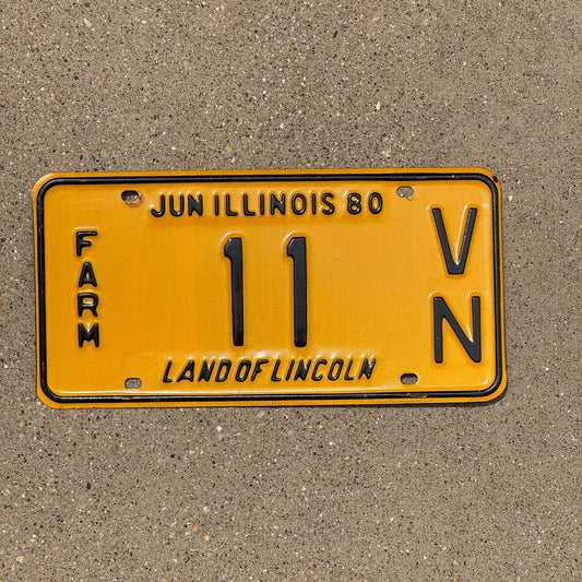 Photo of a 1980 Illinois Farm License Plate Auto Tag Garage Decor Vintage 11 VN
