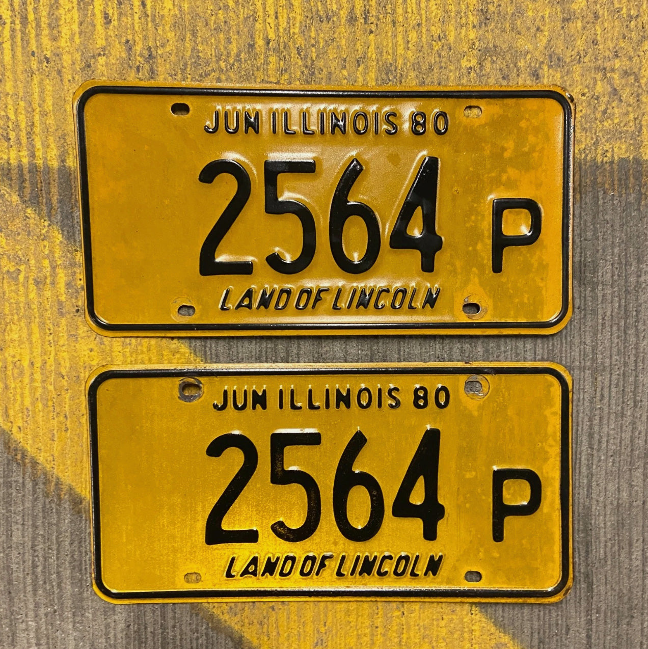 Photo of a 1980 Illinois Truck License Plate Pair Auto Tag Garage Decor Vintage 2564 P with original patina