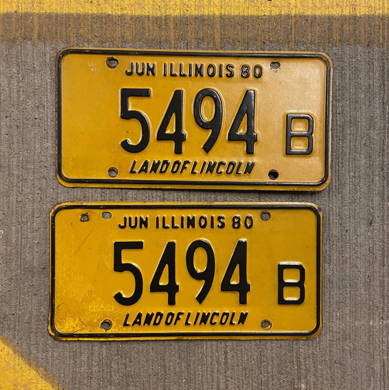Photo of a 1980 Illinois Truck License Plate Pair Auto Tag Garage Decor Vintage 5494 B with original patina
