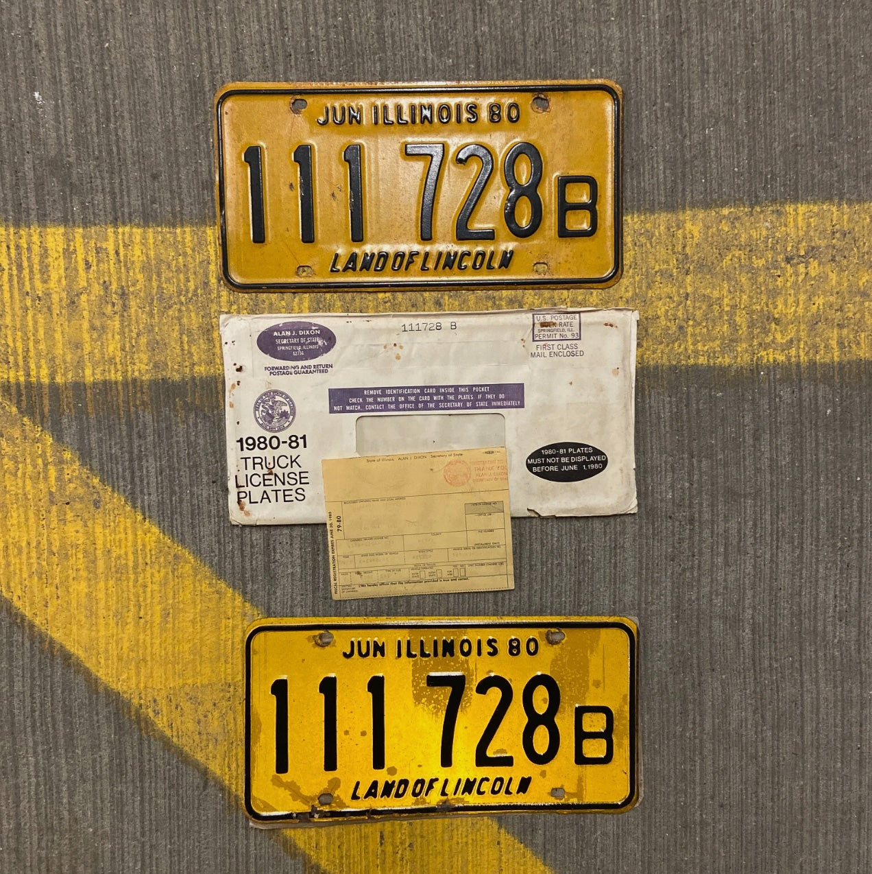 Photo of a 1980 Illinois Truck License Plate Pair Auto Tag Garage Decor Vintage Repeat Repeating 111 728 B with original patina