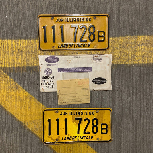Photo of a 1980 Illinois Truck License Plate Pair Auto Tag Garage Decor Vintage Repeat Repeating 111 728 B with original patina