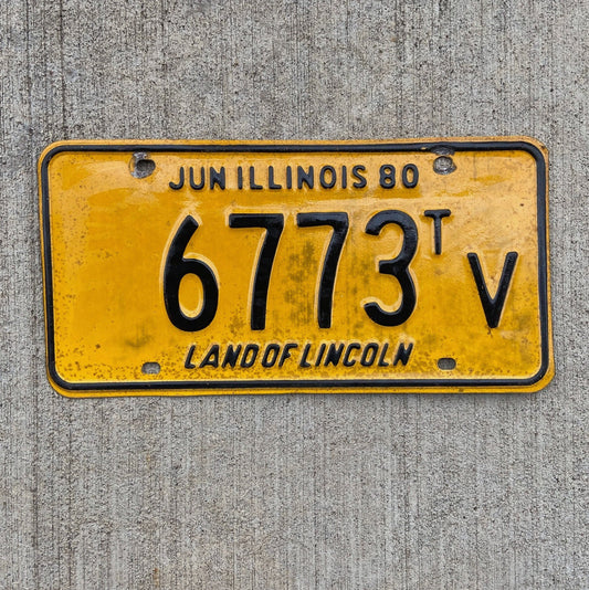 Photo of a 1980 Illinois Truck Tractor License Plate Auto Tag Garage Decor Vintage 6773 TV with original patina