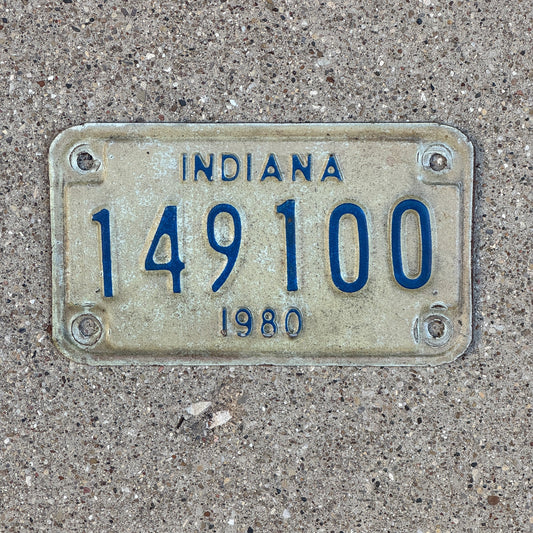 Photo of a 1980 Indiana Motorcycle License Plate Auto Tag Garage Decor Vintage 149100 with original patina