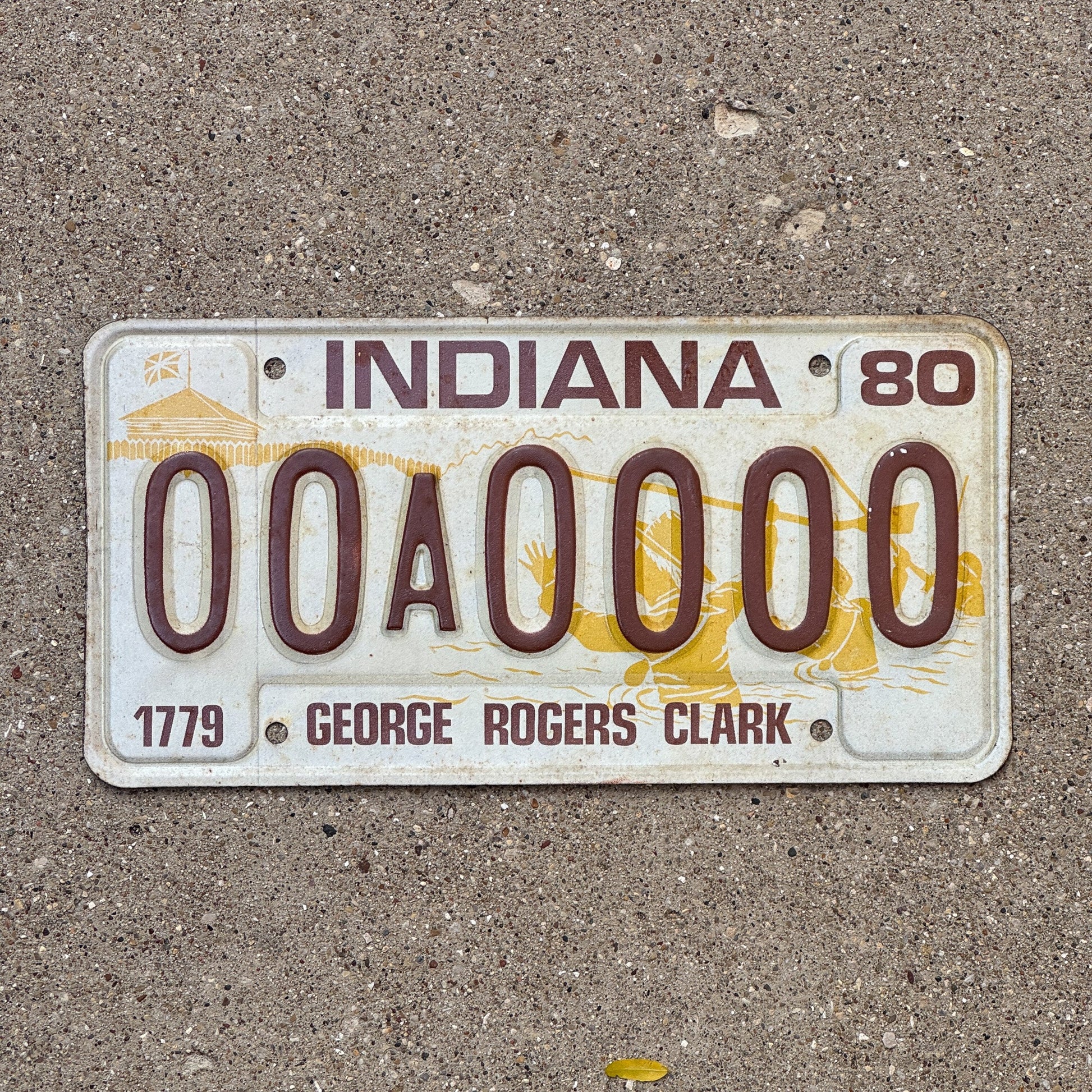 Photo of a 1980 Indiana Sample License Plate Auto Tag 3 Vintage 00A0000 with original patina