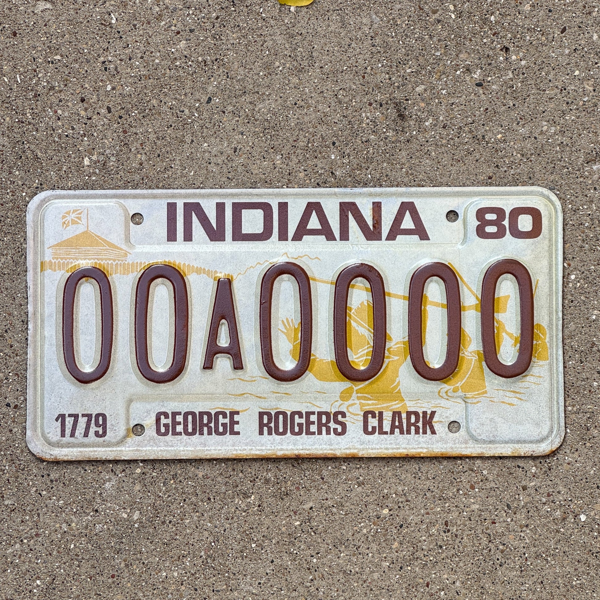 Photo of a 1980 Indiana Sample License Plate Auto Tag 4 Vintage 00A0000 with original patina