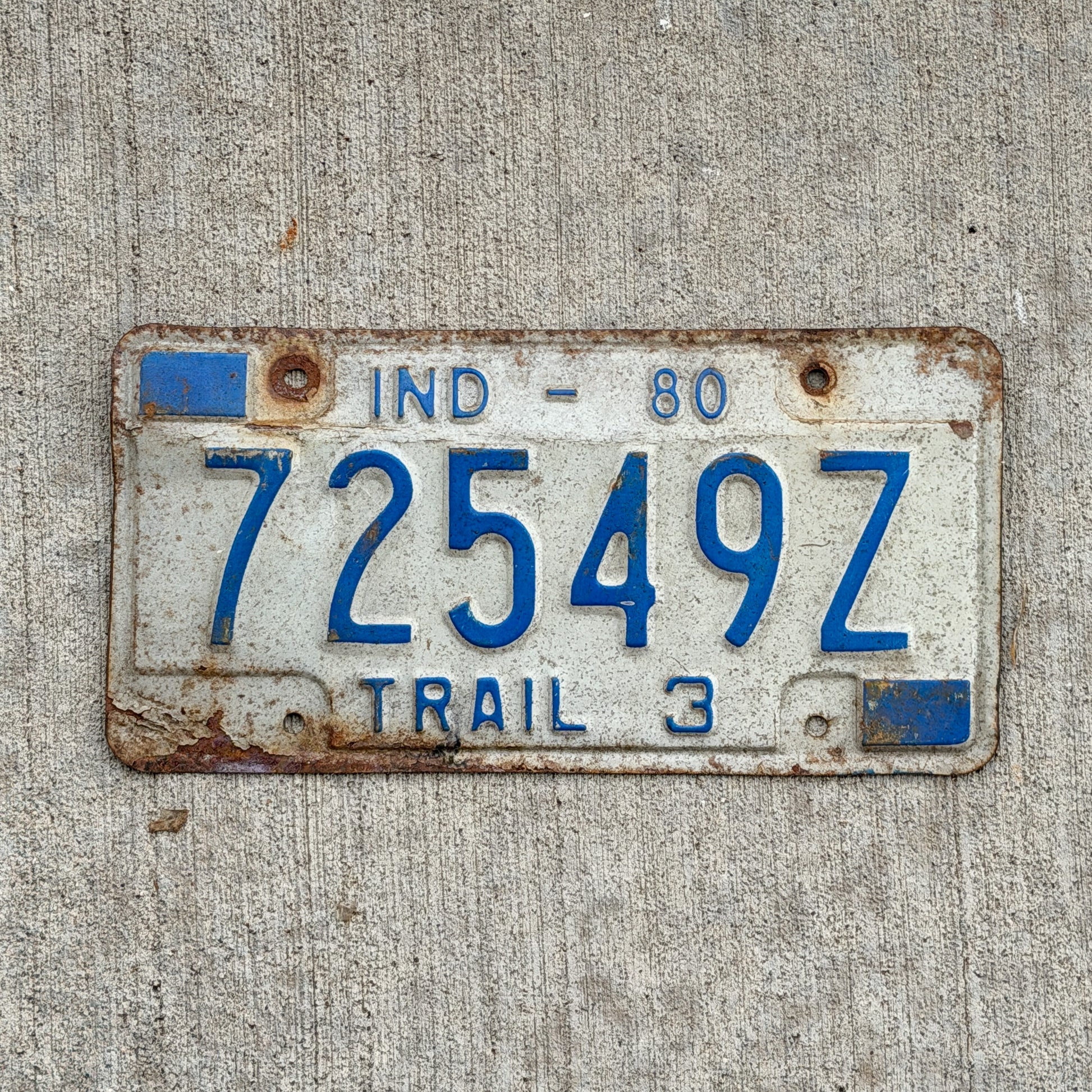 Photo of a 1980 Indiana Trailer License Plate Auto Tag Garage Decor Vintage 72549 Z with original patina