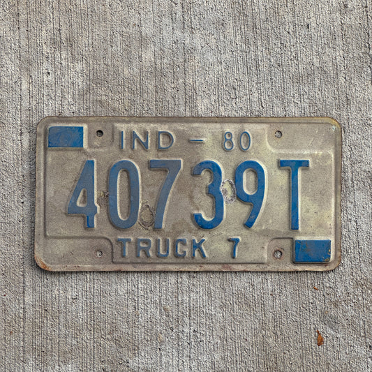 Photo of a 1980 Indiana Truck License Plate Auto Tag Garage Decor Vintage 40739 T with original patina