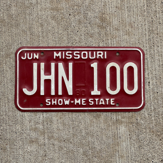 Photo of a 1980 Missouri License Plate Auto Tag Garage Decor Vintage JHN 100 with original patina