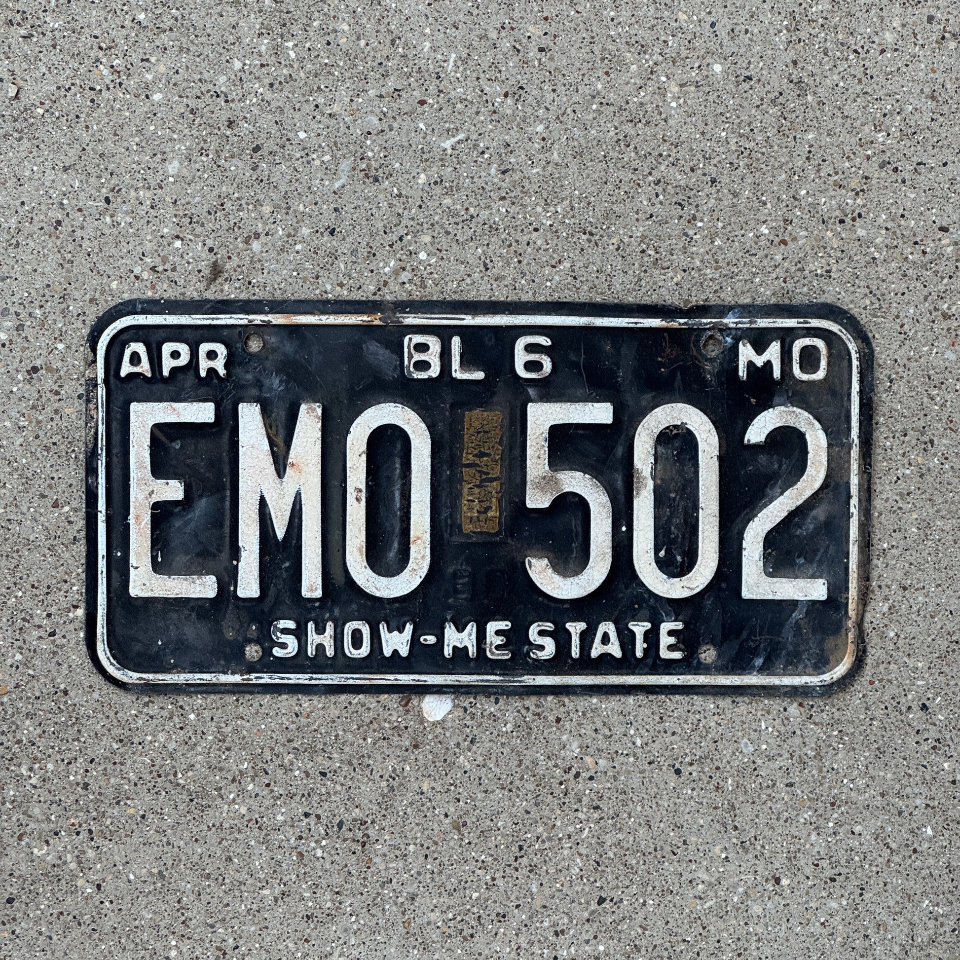 Photo of a 1980 Missouri Truck License Plate Auto Tag Garage Decor Black White Goth EMO 502