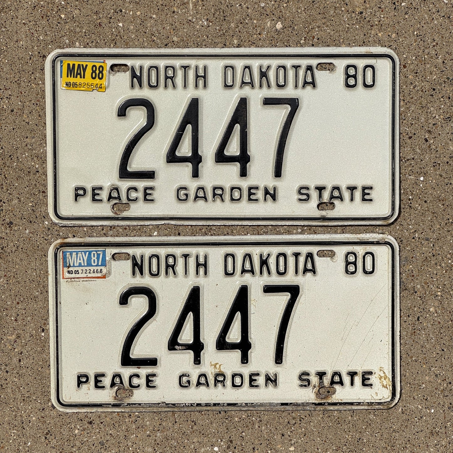 Photo of a 1980 North Dakota License Plate Pair Auto Tag Garage Decor Vintage Four Digit 2447