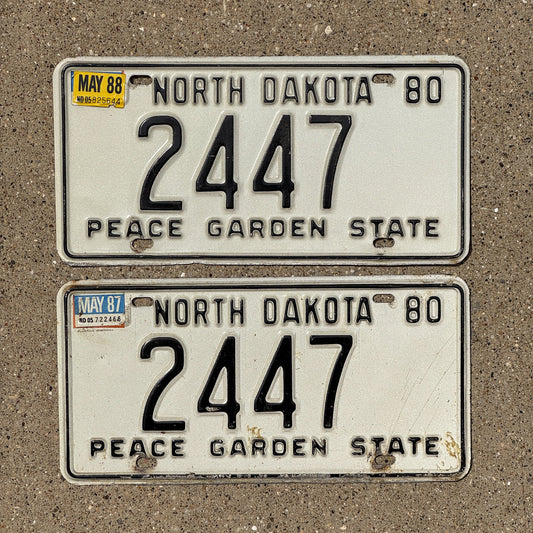 Photo of a 1980 North Dakota License Plate Pair Auto Tag Garage Decor Vintage Four Digit 2447