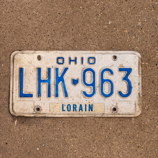 Photo of a 1980 Ohio License Plate Auto Tag 1 Vintage Garage LHK 963 with original patina