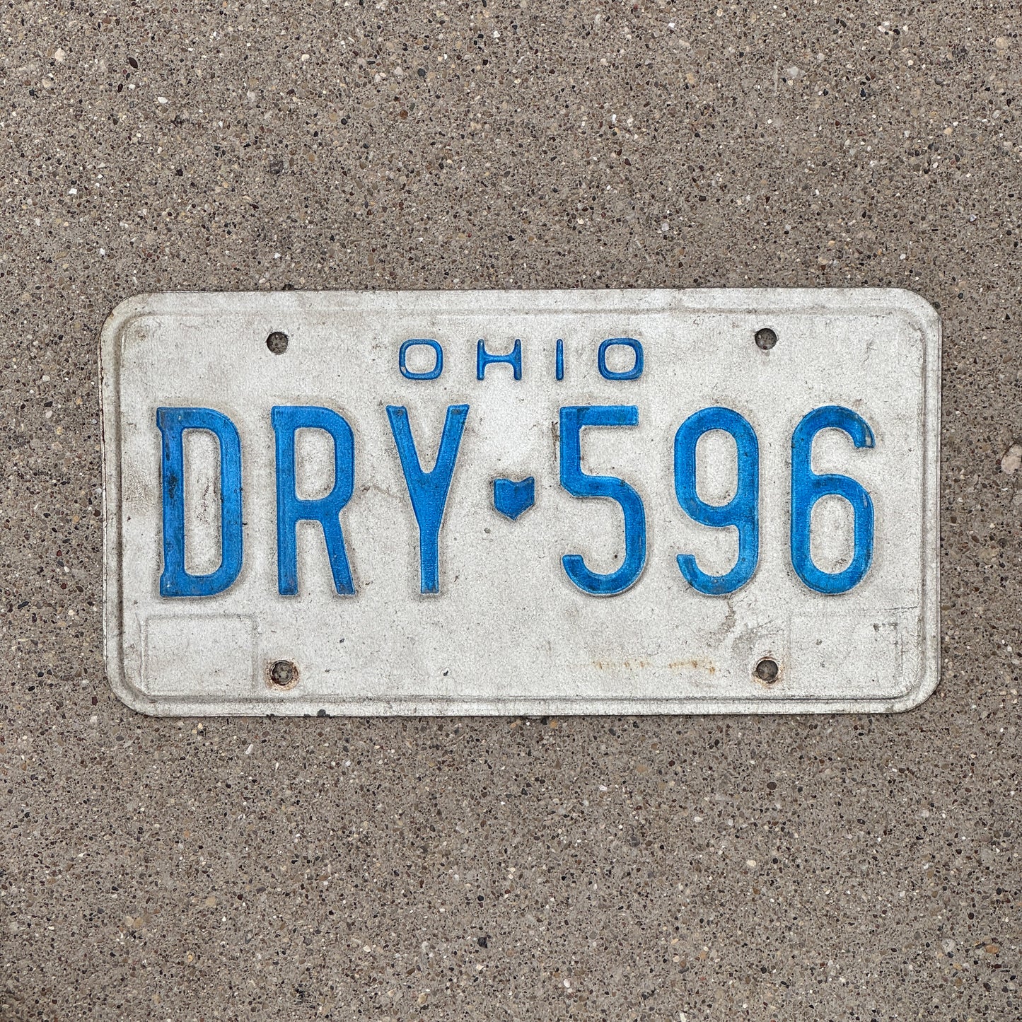 Photo of a 1980 Ohio License Plate Auto Tag 2 Vintage Garage DRY 596 with original patina