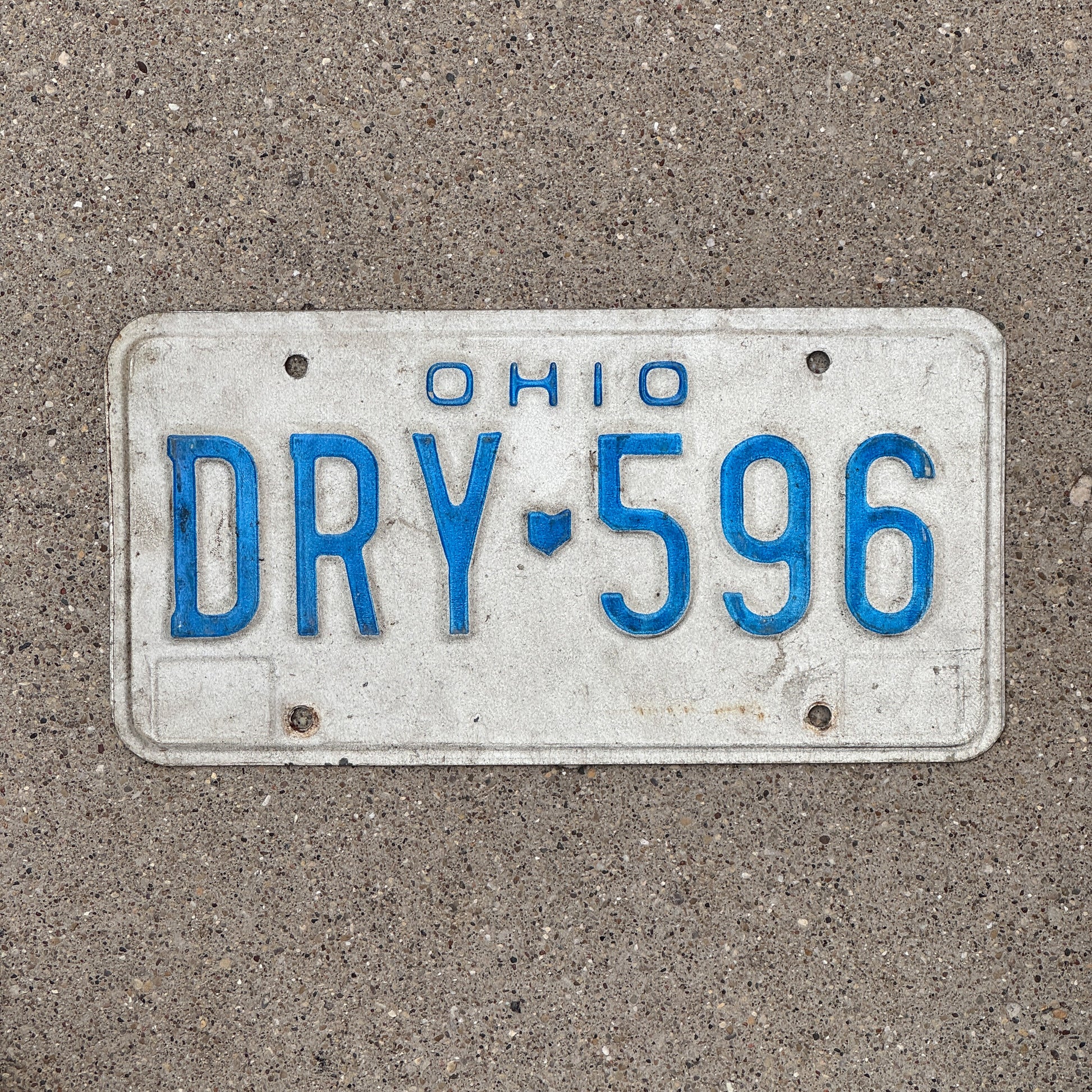 Photo of a 1980 Ohio License Plate Auto Tag 2 Vintage Garage DRY 596 with original patina
