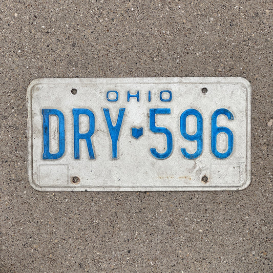Photo of a 1980 Ohio License Plate Auto Tag 2 Vintage Garage DRY 596 with original patina