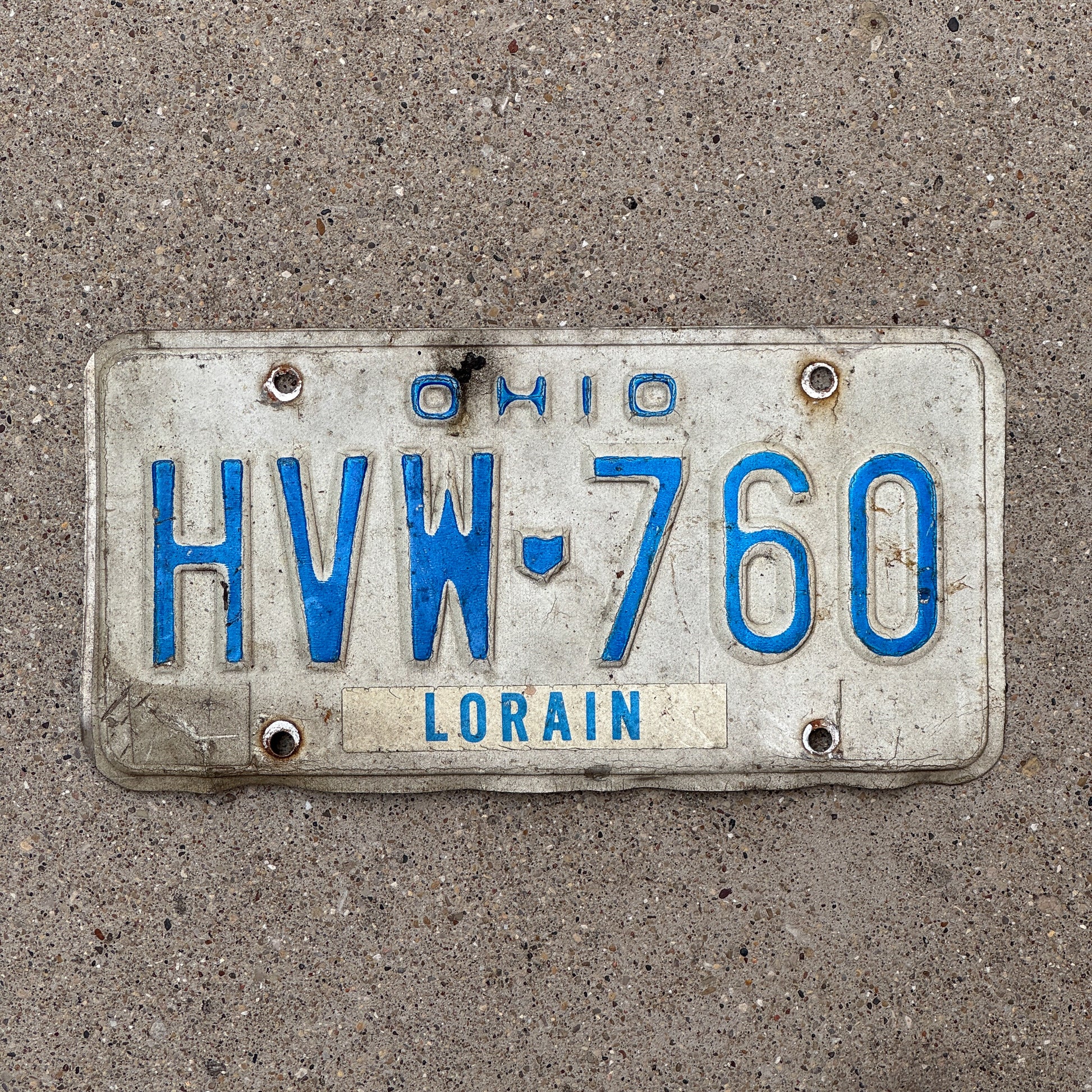 Photo of a 1980 Ohio License Plate Auto Tag 2 Vintage Garage HVW 760 with original patina