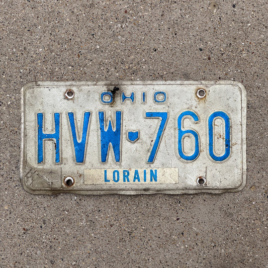 Photo of a 1980 Ohio License Plate Auto Tag 2 Vintage Garage HVW 760 with original patina